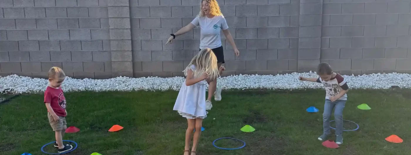 Kids performing exercise in the backyard